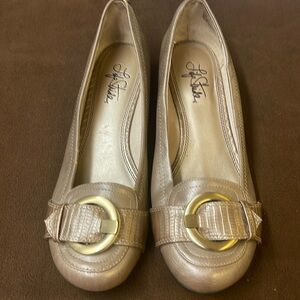 Ladies gold color slip on shoes